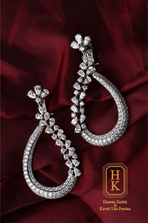   Round White Brilliant :5.21 ct No.188Pear White Brilliant :4.72 ct No.30Weight :21.790 gr 0000 : Invoice No Date :27/09/1396 